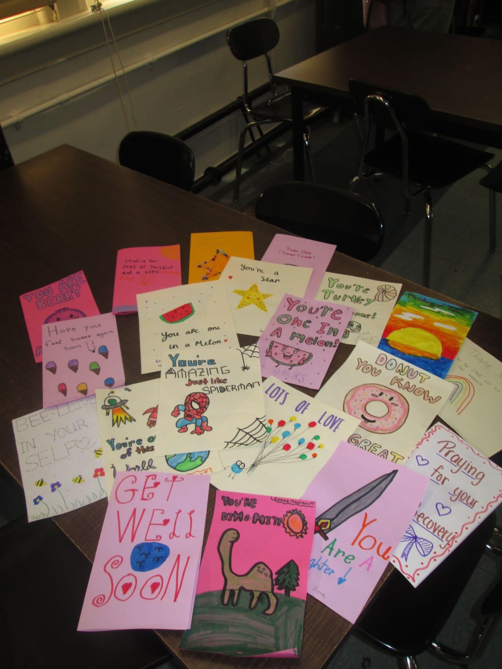 A collection of colorful handmade support cards
