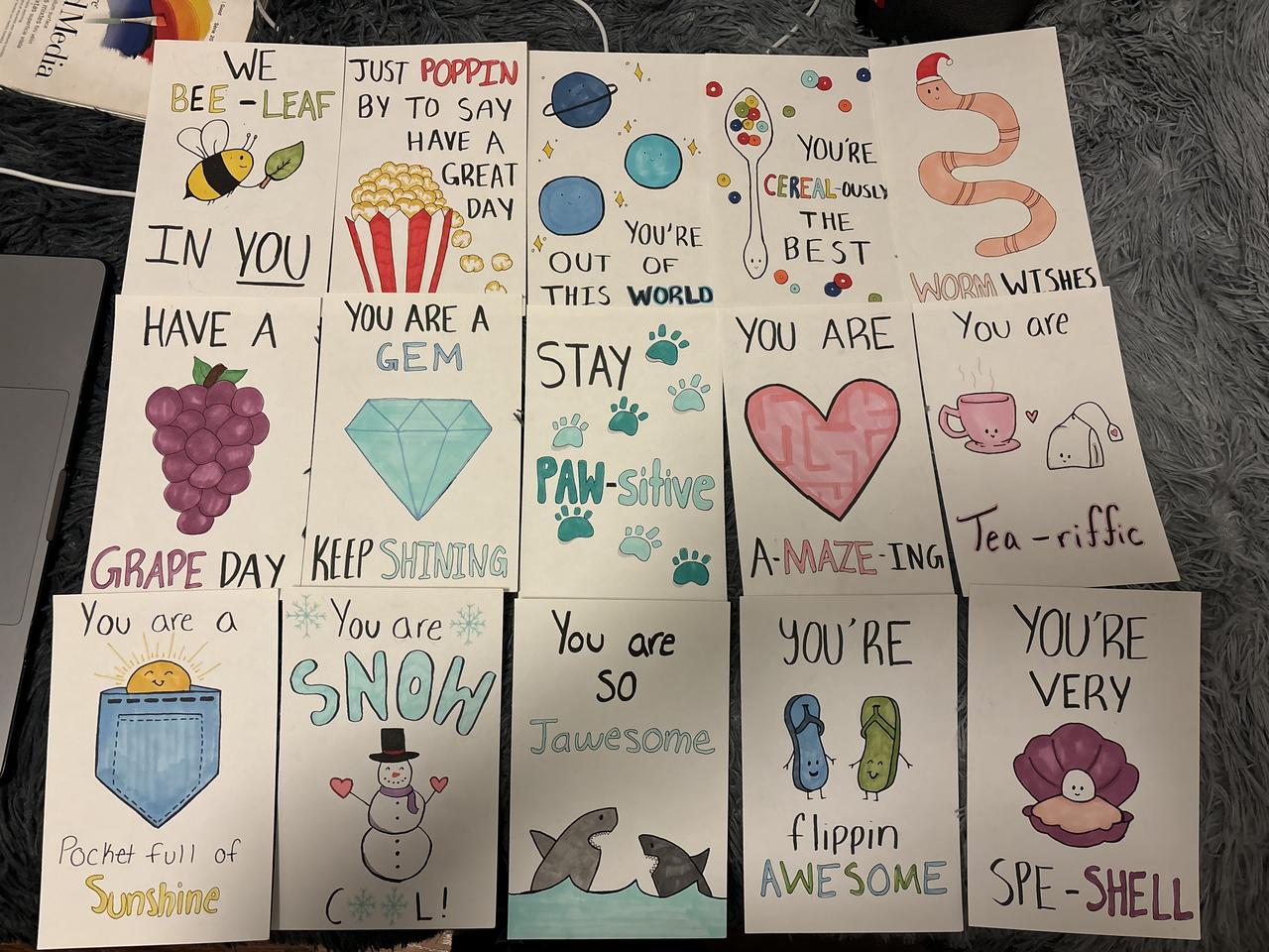 Encouraging messages and illustrations on student-made cards